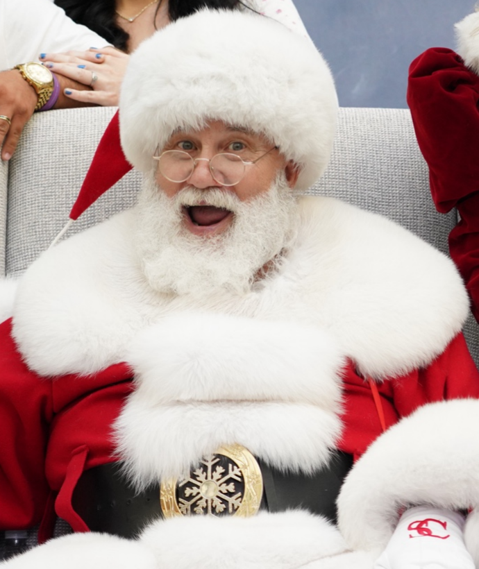 Santa smiling during a portrait in ROCO’s holiday photography portfolio